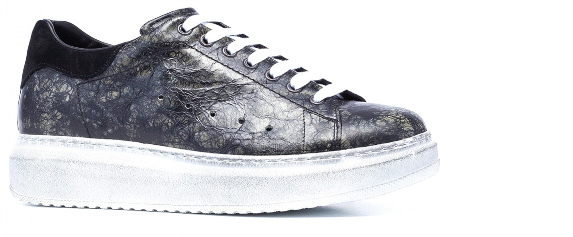 scarpe artigianali con rialzo