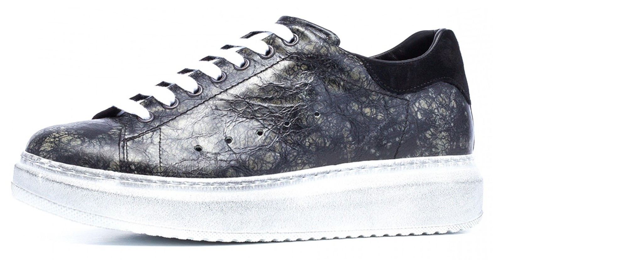 scarpe artigianali con rialzo