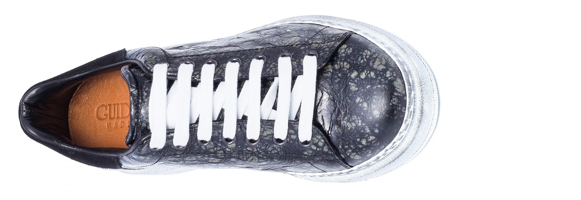 scarpe artigianali con rialzo